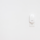 The Eero Beacons basically blend into the background, especially if you have white walls.